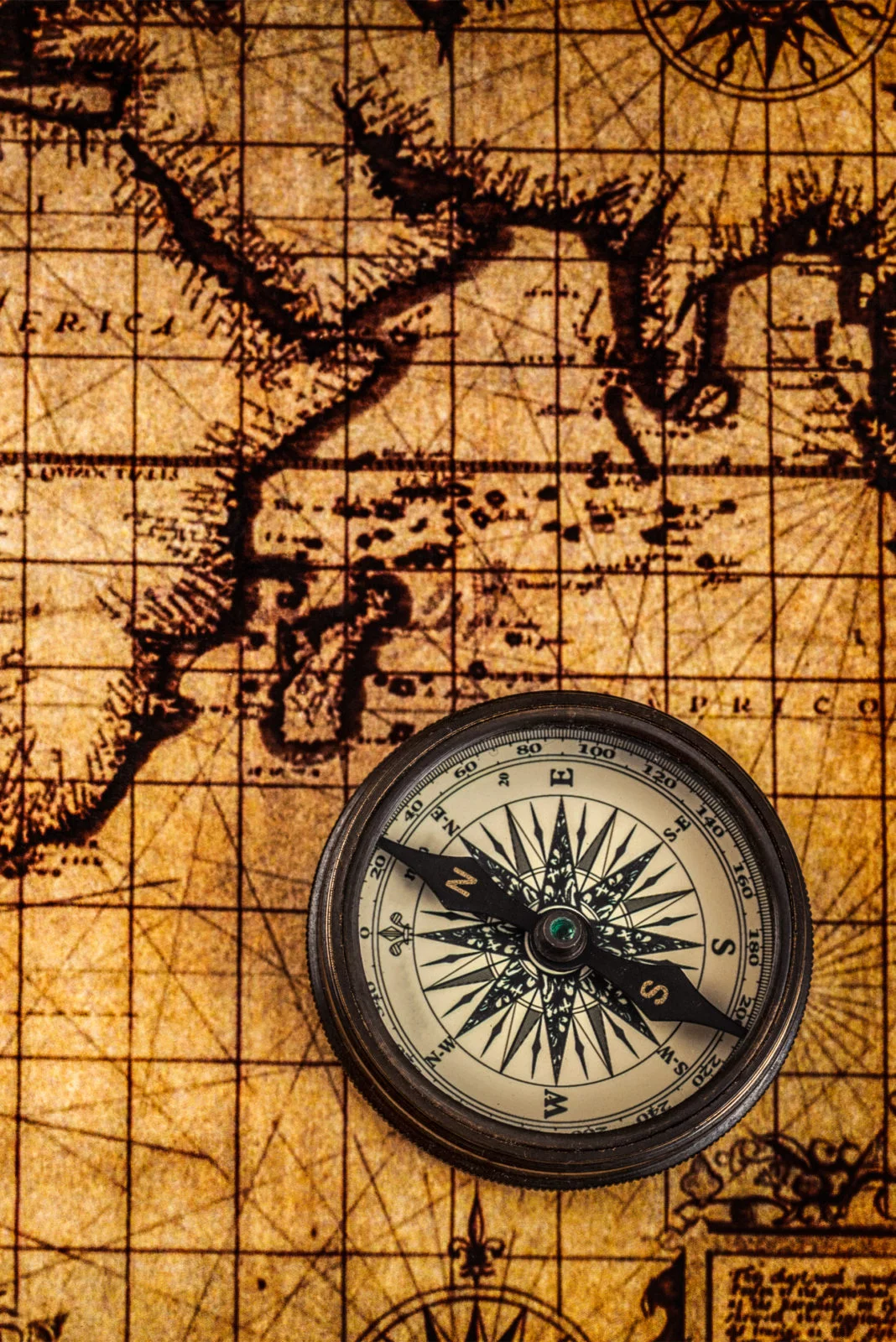 Map of the world with a compass