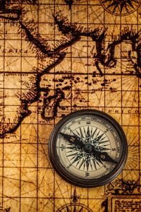 Map of the world with a compass